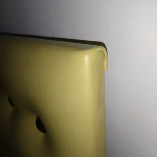 Cabecero acolchado capitoné con mesilla integrada