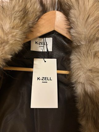 Chaqueta marrón con cuello de pelo