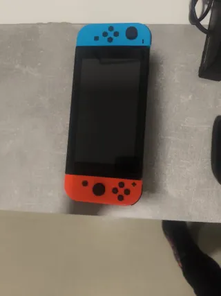 Nintendo Switch + Accesorios y Juegos