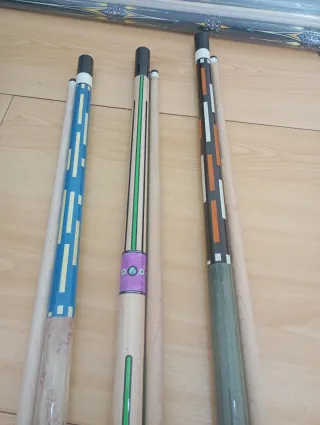 Taco de billar tres bandas