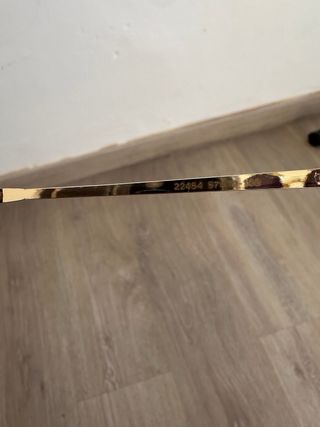 Gafas de sol Miu Miu doradas y moradas