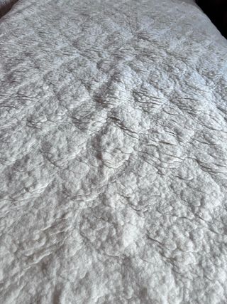 Cubre colchón de lana beige