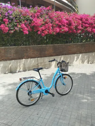 Bicicleta azul como nueva