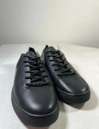 Zapatos de cuero Clae negros y marron