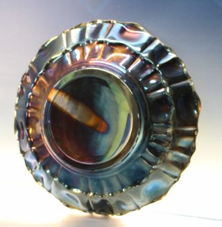 Bandeja, centro de mesa metal tornasolado, iridiscente. Orbisa MTL.