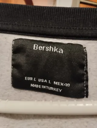 Sudadera Unreleased. manga ranglán