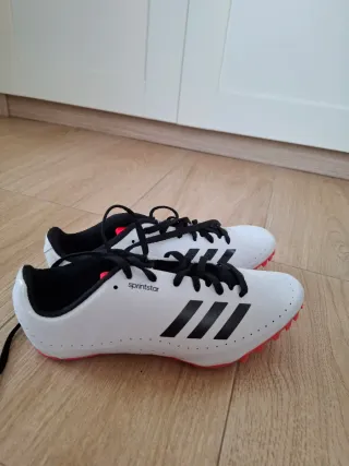 Zapatillas Adidas Atletismo Blancas y ROJAS.