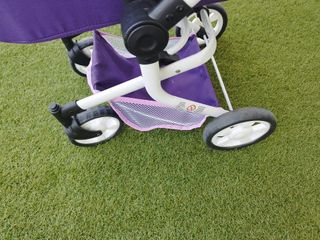 Silla de paseo para muñecas morada