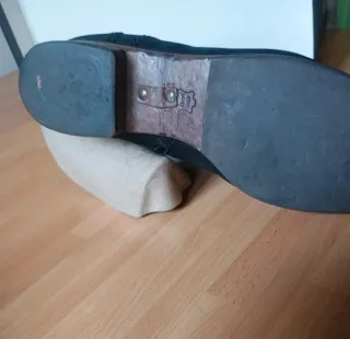 Botines negros planos de piel