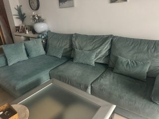 Chaiselongue de tela verde aqua,