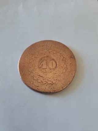 Antigua moneda de cobre
