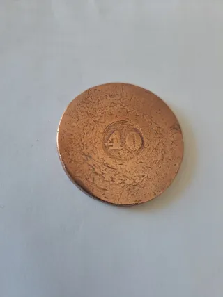 Antigua moneda de cobre