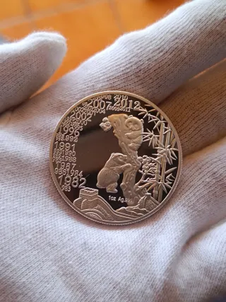 Onza de Plata Panda 1oz Ag.999. En cápsula