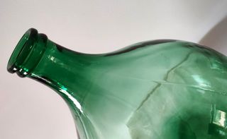 Damigiana in vetro verde per alimenti