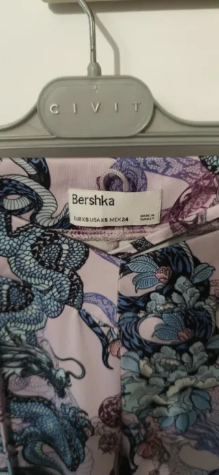 Pantalón campana estampado dragones