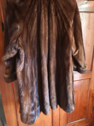 Caldo cappotto in pelliccia