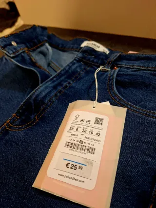 Pantalones vaqueros beige desgastados