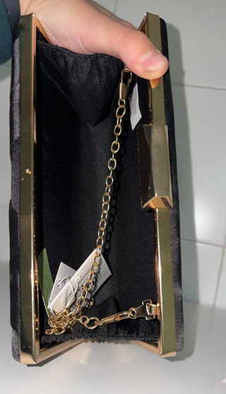 Bolso de fiesta negro y dorado