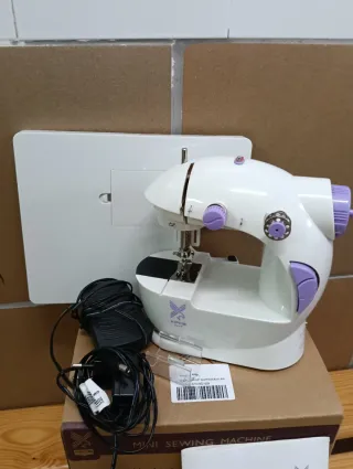 Máquina de coser mini nueva lo de la foto