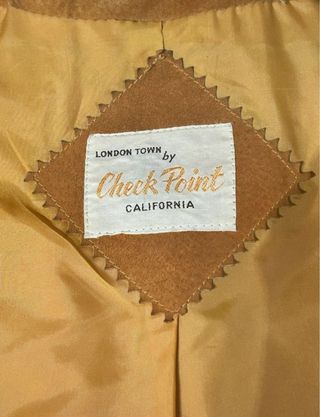 Abrigo de piel auténtica con cinturón