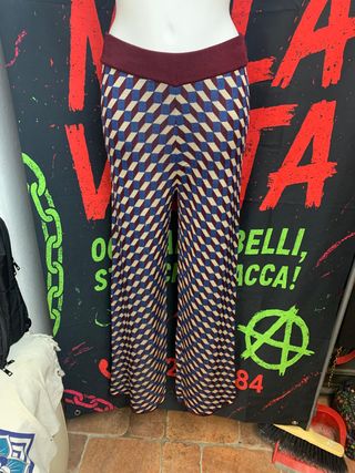 Pantaloni a palazzo fantasia geometrica