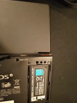 Console Nintendo DSi nera, custodia Mario per piedi