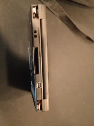 Console Nintendo DSi nera, custodia Mario per piedi