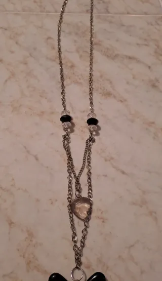 Collane lunghe con ciondoli cuore e fiocco