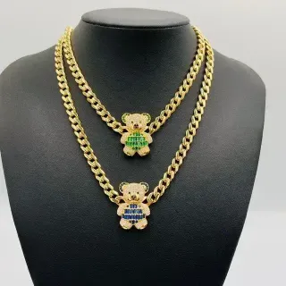 GARGANTILLA BARBADA OSO AZUL. Oro18k.