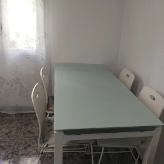 Mesa cristal y 6 sillas comedor