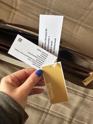 Bolso Michael Kors blanco y marrón