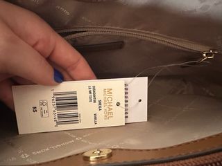 Bolso Michael Kors blanco y marrón