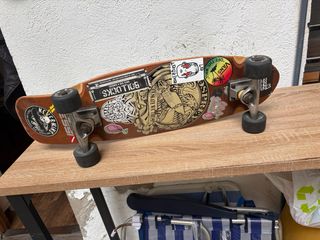 Longboard Carver con ruedas Vans