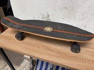 Longboard Carver con ruedas Vans