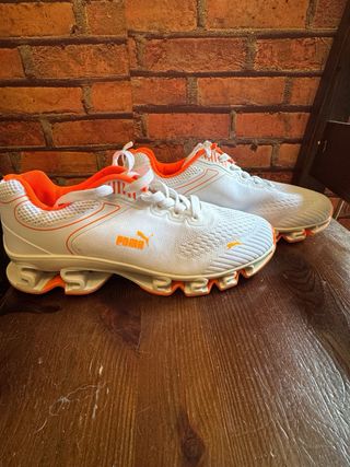 Scarpe da corsa bianche e arancioni 40 taglia