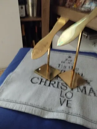 Espositore per scarpe in metallo dorato