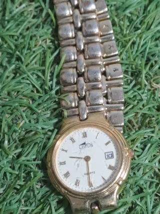 Reloj Lotus Dorado para Reparar