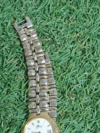 Reloj Lotus Dorado para Reparar