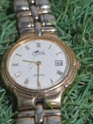 Reloj Lotus Dorado para Reparar
