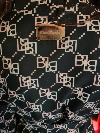 Vestido estampado negro y rosa