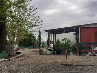 Terreno con caseta y porche