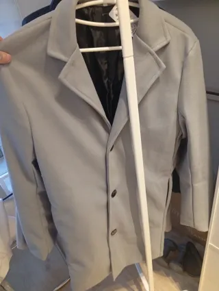 Abrigo gris nuevo