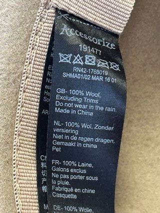 Sombrero de lana beige y negro