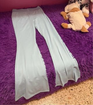 Pantaloni donna blu a zampa