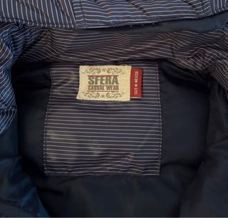 Chaleco acolchado con capucha y rayas