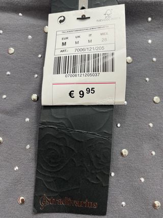 Falda Stradivarius gris con pedrería