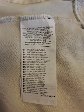 Sudadera Nike Tech Fleece Windrunner gris y blanca