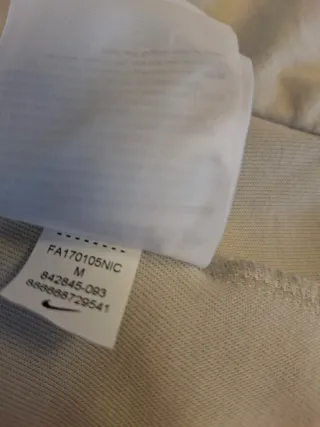 Sudadera Nike Tech Fleece Windrunner gris y blanca