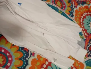 Camisa Scalpers blanca con calavera