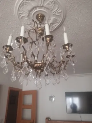 Lámpara de araña de cristal y metal